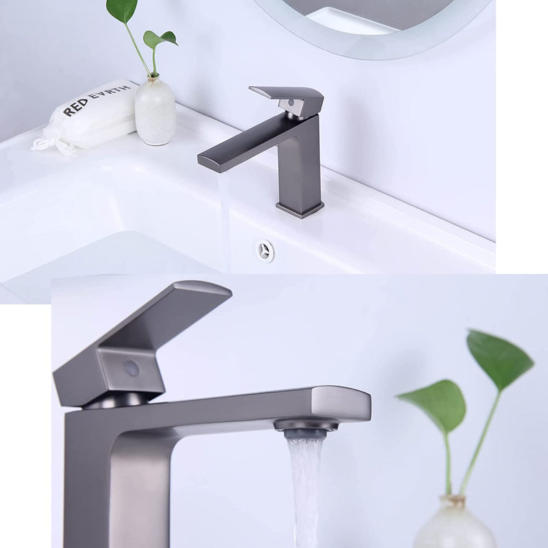 Evos Boutiques dark grey faucet running water