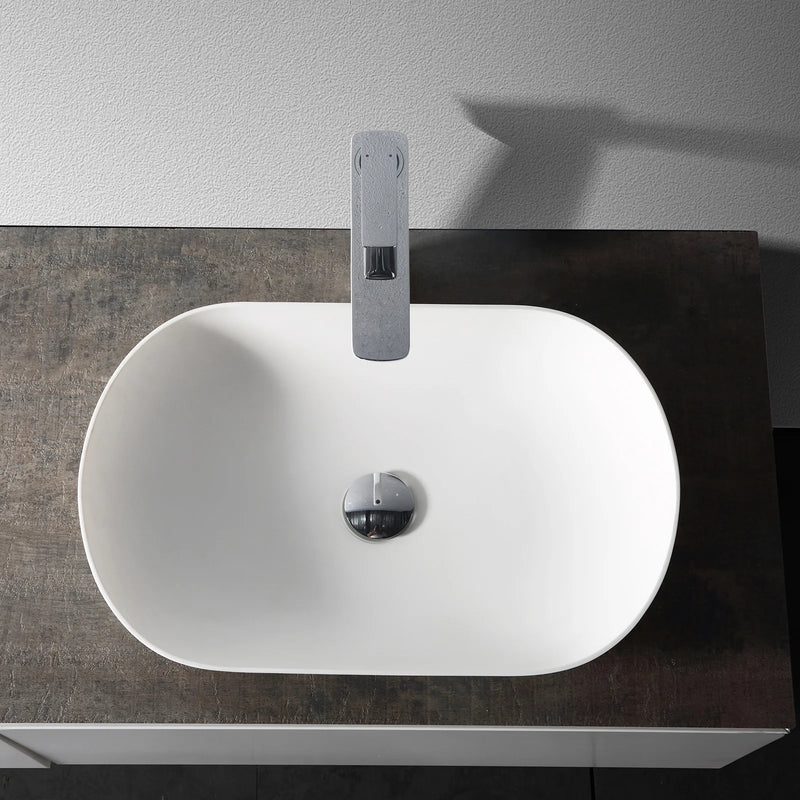 Evos Boutiques  mineral cast countertop washbasin looking down