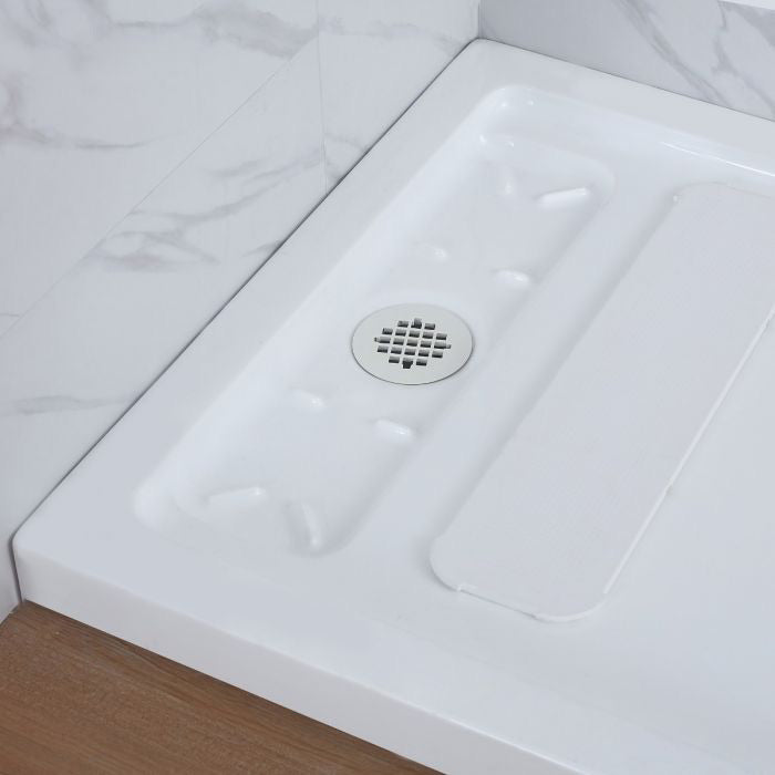 Evos Boutiques shower drain base close up view 48 in x 32 in